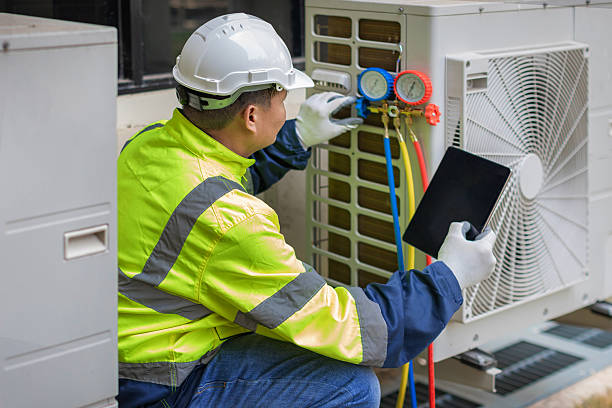 Professional Air Conditioning Repair technician working in Dickinson, ND
